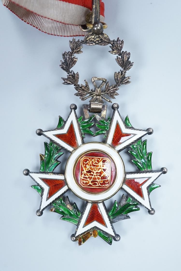 Zanzibar, Order of the Brilliant Star, Ali II bin Hamad (1902-11) issue, unmarked (probably by Elkington), in silver-gilt and enamels, with gold and enamelled centre, with neck riband